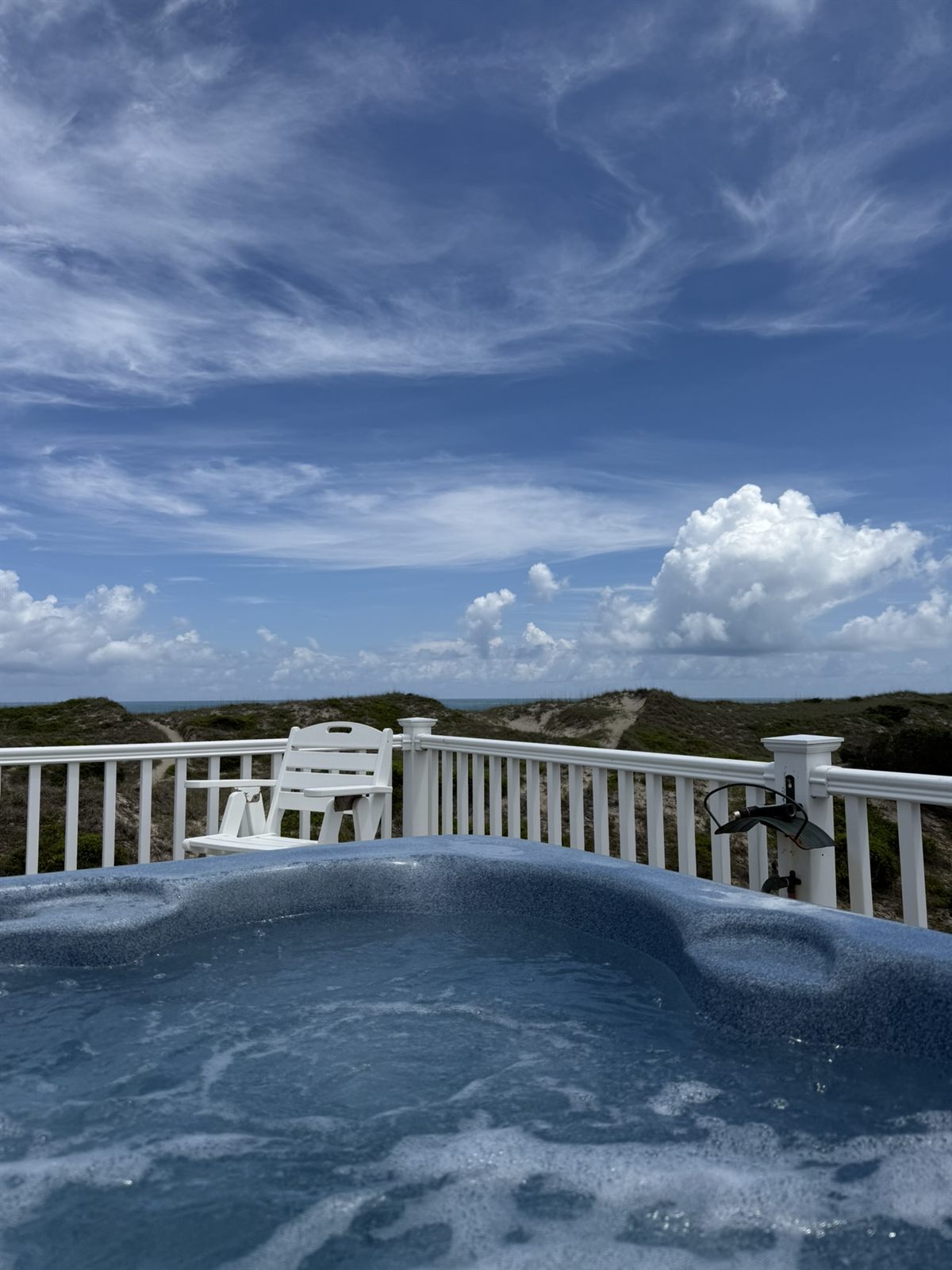 Private hot tub on the sundeck with an ocean view