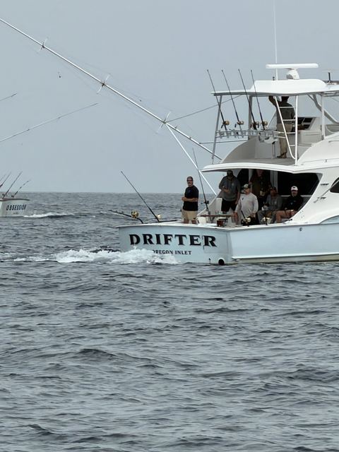 Drifter running past with her crew on deck