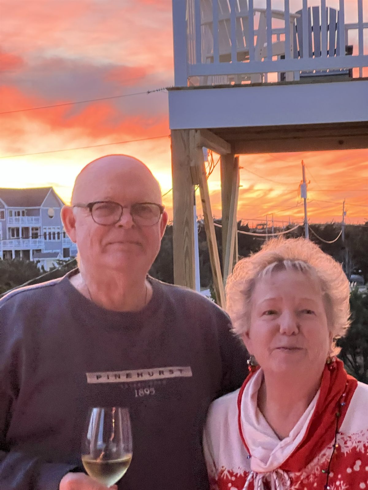 Enjoying a glass of wine at sunset on the deck